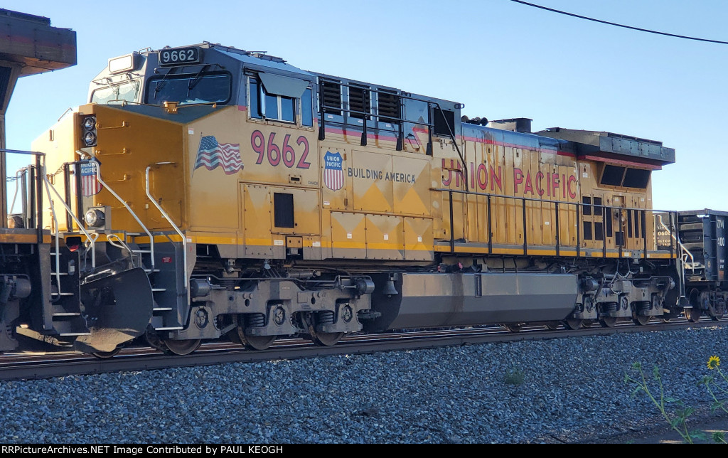 The Setting Sun Reflects off UP 9662 as She Pulls A Manifest Train as the #2 Unit towards UP Green River Yard Wyoming. 